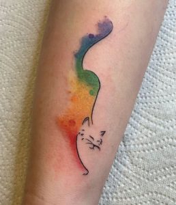 27 Incredible Rainbow Art Cat Tattoo on Forearm