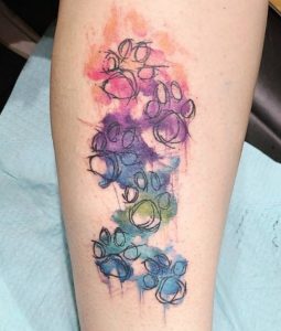 27 Phenomenal Water Color Spash Pussy Cat Paw Print Tattoo for Female on Behind the Lower leg