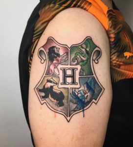 28 Four Most Ferocious Gryffindor Tattoo on Arm