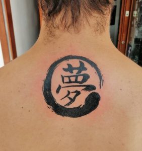 30 Beautiful Japanese Kanji Tattoo in the Circle on Back