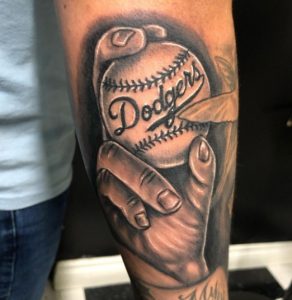 31 Black ink Illustration World Best Baseball Team Name Dogers Tattoo on Half Hand