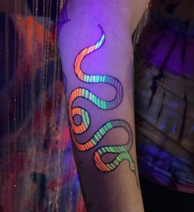 35 Snake Rainbow Tattoo on Forearm