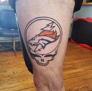 36 Broncos on Skull Tattoo on Thigh