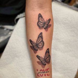 4 Black Red Inked Butterfly with Name Tattoo for Pretty Female on Half Sleeve