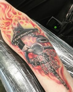 Fire Department bombers Tattoo on the arm