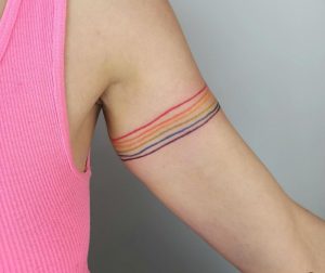 40 Creative Ring Design Rainbow Tattoo on Arm