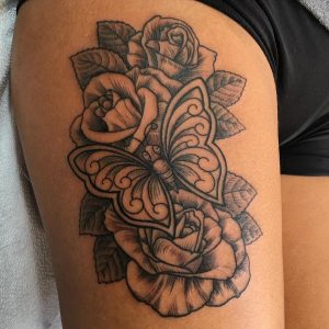 43 Lovely Black Inked Roses with Butterfly Tattoo on Thigh