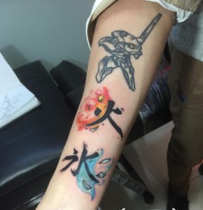47 Color Ink Kanji Tattoo on Half Arm