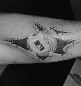 5 Black Ink Illustration Baseball in Stitches Tattoo on Half Arm