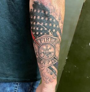 Multicolor Fire Department Tattoo on Elbow to Wrist