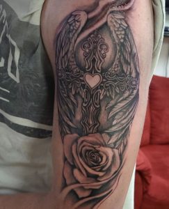 5 Outstanding Black Gray Inked Heart with Eagle Wings Cross Designed Tattoo on Half Arm