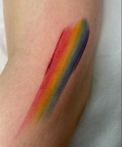 54 Rainbow Wipe of Paintbrush Tattoo Arm