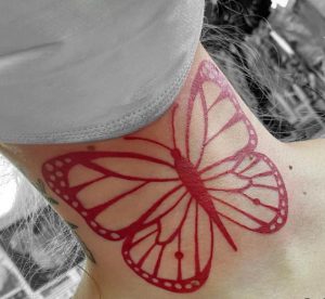 6 Amazing Red Inked Butterfly Tattoo for Female on Front Neck Throat
