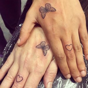 6 Black Ink Design Butterfly Tattoo for Meaning Emotional Family Bonding Between Mother and Daugheter on Finger