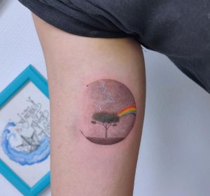 68 Rainbow Beside A Tree Tattoo on Arm