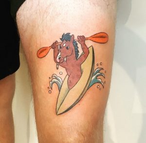 7 Beautiful Color Ink Horseman with Orange Paddle Kayak Tattoo on Thigh