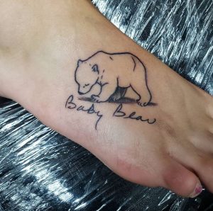 7 Cute Ink Baby Bear Cub With Writting Tattoo on Foot