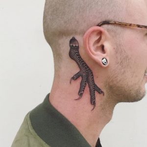 7 Incredible Solid Dark Ink Designed Bird Claw Tattoo Behind the Ear