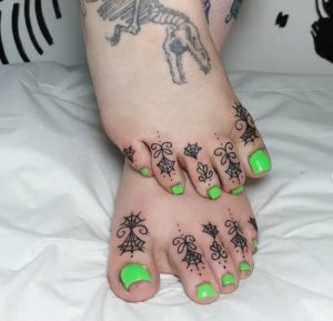 7 Ornamental Web Toe Tattoo