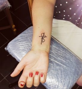 8 Cute Tiny Double Heart with Cross Tattoo on Forearm