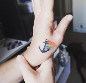 80 Anchor with Rainbow Tattoo on Wrist