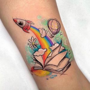 83 Rainbow Rocket Steam Tattoo on Forearm