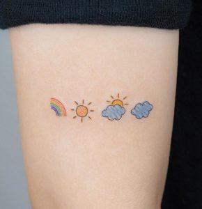 Rainbow Sun Cloud Tattoo on Arm