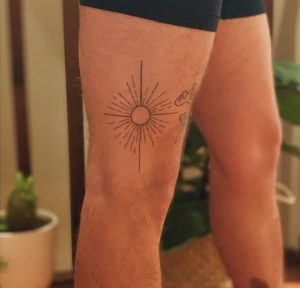 Machine free Sunburst Tattoo on the thigh