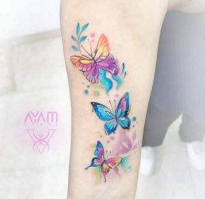 94 Pretty Rainbow Butterfly Tattoo on Arm