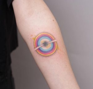 97 Black Hole with Rainbow Circle Tattoo on Forearm