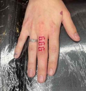 999 Tattoo on Finger