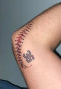 Baseball stitch tattoo on elbow 1
