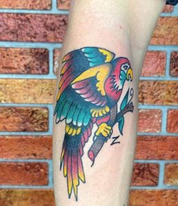 Cute parrot tattoo 6