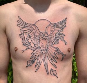 Parrot chest tattoo