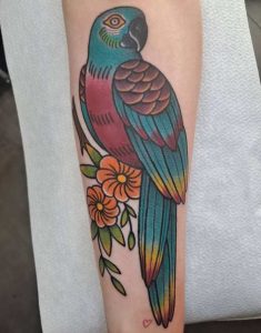 Parrot tattoo on forearm 4