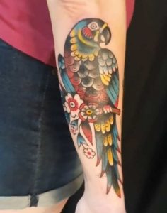 Parrot tattoo on forearm 6