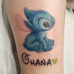 Stitch tattoo located on the calf cartoon style