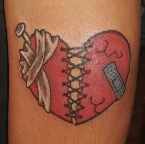 Stitches heart Tattoo 1