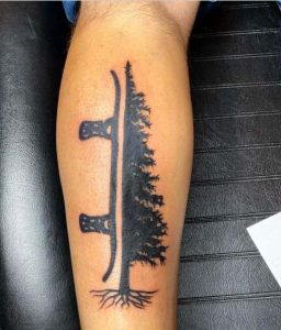 Snowboard With A Tree Tattoo