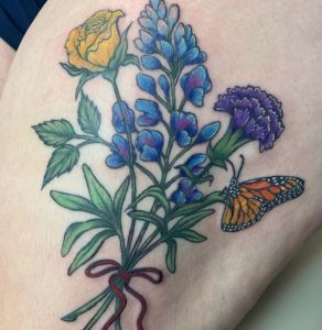 Butterfly and Flower Thigh Tattoo