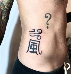 Japanese Black Rib Tattoo