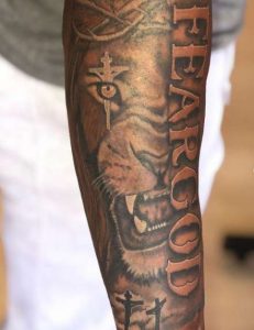Lion And Fear God Tattoo