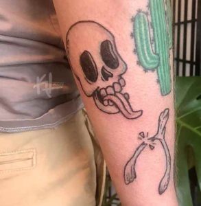 Broken Wishbone With Skull Tattoo
