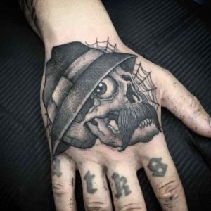 Hand-cover Spidernet Cholo Tattoo