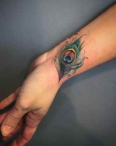 Peacock Wrist Feather Tattoo