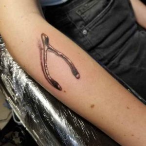 Realistic Wishbone Tattoo