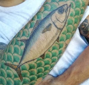 Big Tuna tattoo with green background