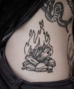 Dark simple campfire tattoo
