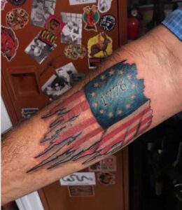 Flag Patriotic Tattoo On Upper Arm