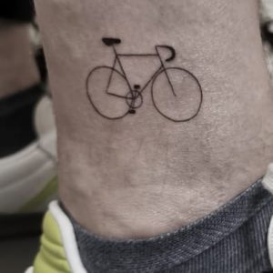Minimalist Bicycle tattoo on the leg